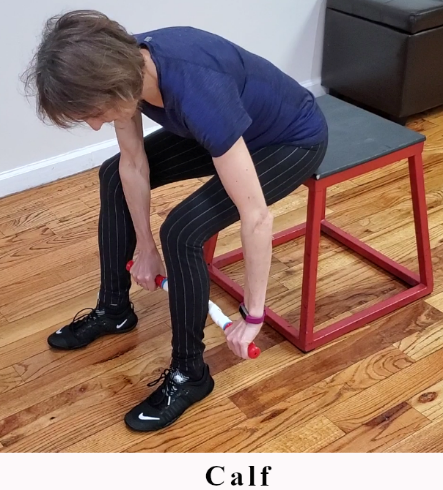 Seated trigger point release using The Stick on the calf.