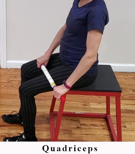 Seated trigger point release using The Stick on the quadriceps.